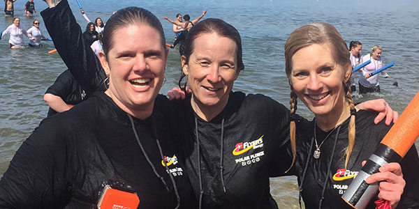 Image of three Flyers employees at the Special Olympics Polar Plunge Fundraising Event