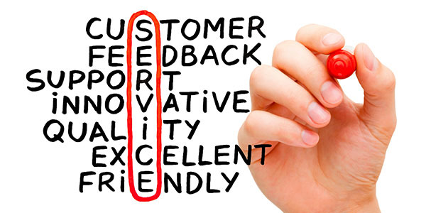 Image with stacked words that include: Customer, Feedback, Support, Innovative, Quality, Excellent & Friendly. These words are aligned so that the hand with the red marker selectively circles the word " SERVICE" in a vertical fashion.